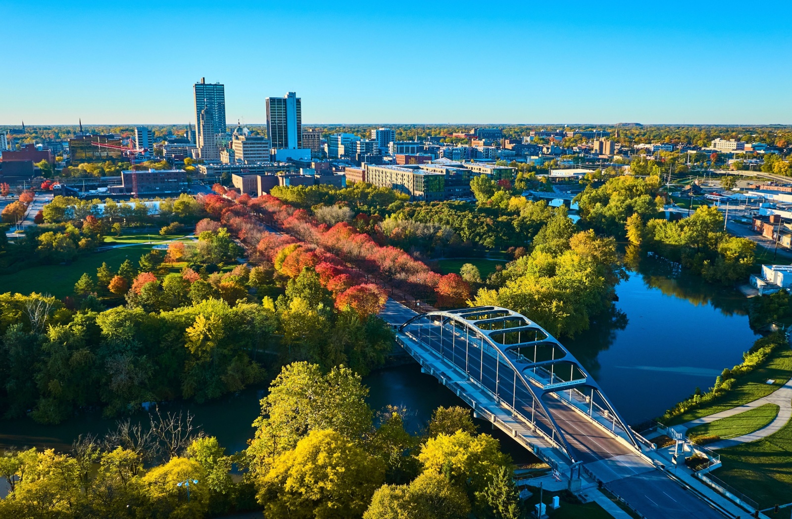 An overhead shot of a road leading to Fort Wayne, Indiana, during a clear day in the autumn.